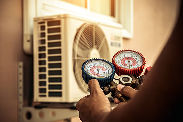 Professional Ac Installation technician working in Winchester, MA